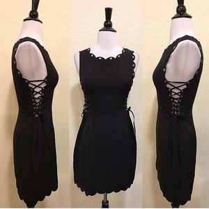 Black scalloped edge lace up dress